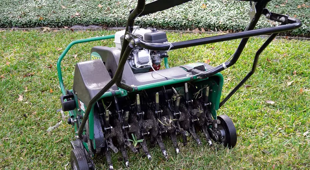Professional Lawn Aerator Machine with Multiple Tines for Aeration, Dethatching, and Overseeding Services